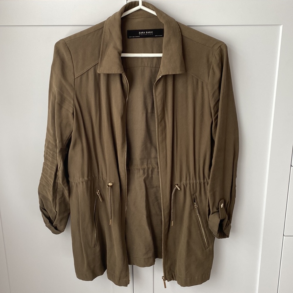 Green light jacket with gold hardware